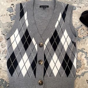 Grey, black, white button up sweater vest